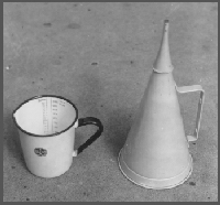 Marsh funnel; used to measure weight and viscosity of drilling "mud".