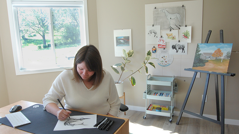 Artist receives SNR award, offers design services across university