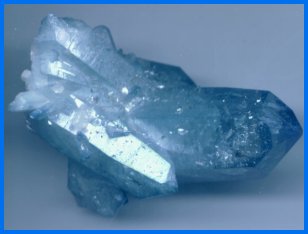 Aqua Aura TM is quartz with a very thin coating of gold that produces a pale to medium blue aquamarine substitute.