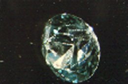 Faceted zircon, note doubled back facets.