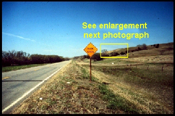 Falling Rock Sign, Thayer County, Nebraska. The road was developed in the Cretaceous-Greenhorn-Graneros formations. The road was temporarily closed by a landslide in the Spring of 1997