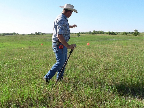 Ben Beckman, senior Grasslands Ecology and Management major, is in charge of vegetation sampling in the areas where prairie chickens have been found with their broods. He documents each site with multiple photos. 