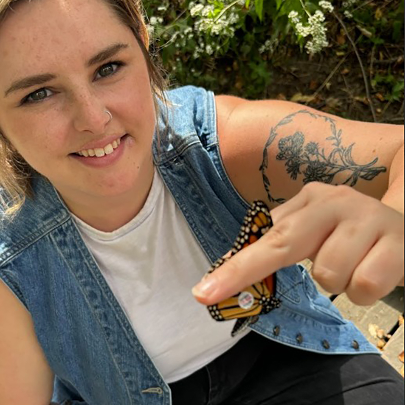 Hannah Miller with butterfly