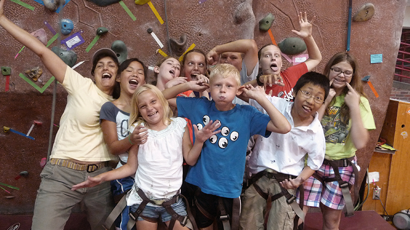 Lisa Pennisi and students at climbing wall