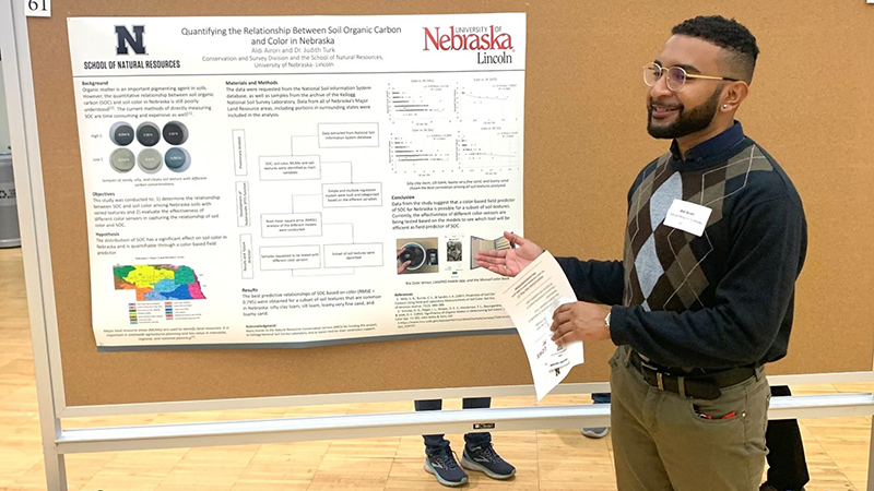 Aldi presenting his thesis project at Nebraska Student Research Day (Spring 2022)
