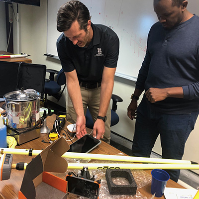 Uden and Nshutiyayesu prepare instruments