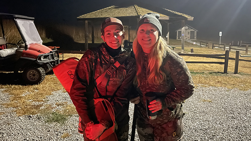 Maddy Vasquez and Ava Britton preparing for early morning duck hunt