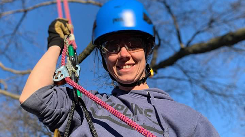 Ann Powers in climbing gear