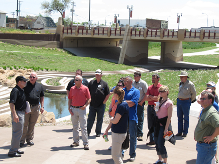 Water Leaders Academy participants listen to Glenn Johnson, far left, General Manager of the Lower Platte South Natural Resources District, describe the Antelope Valley Flood Control Project