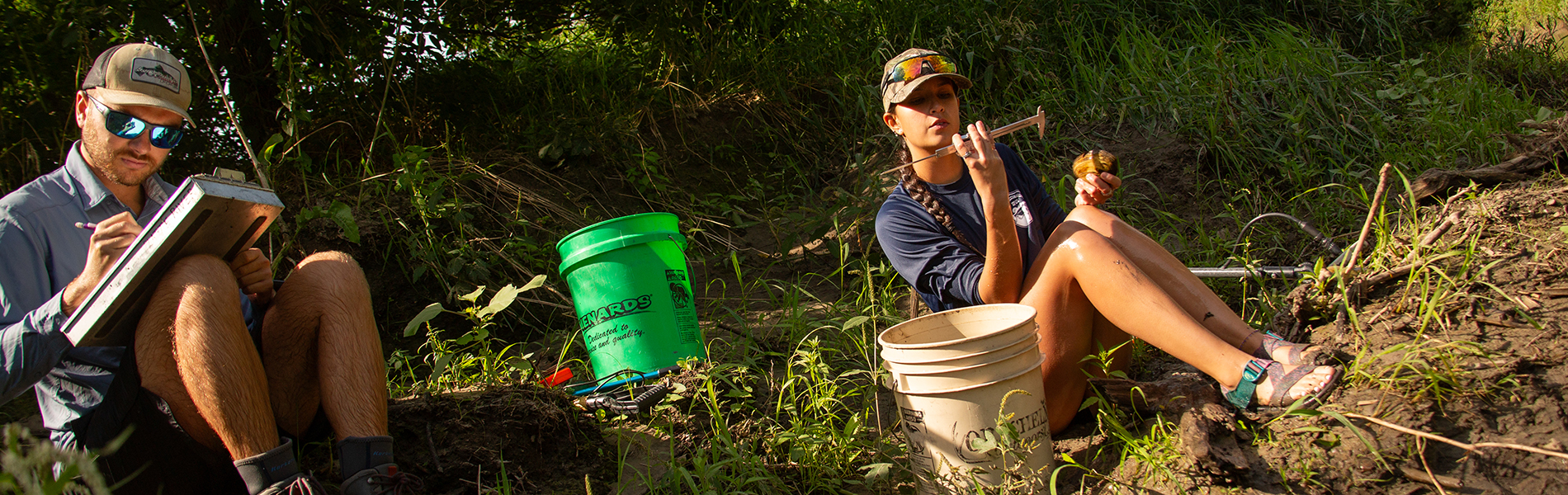 Two students collecting Fresh Water Mussels